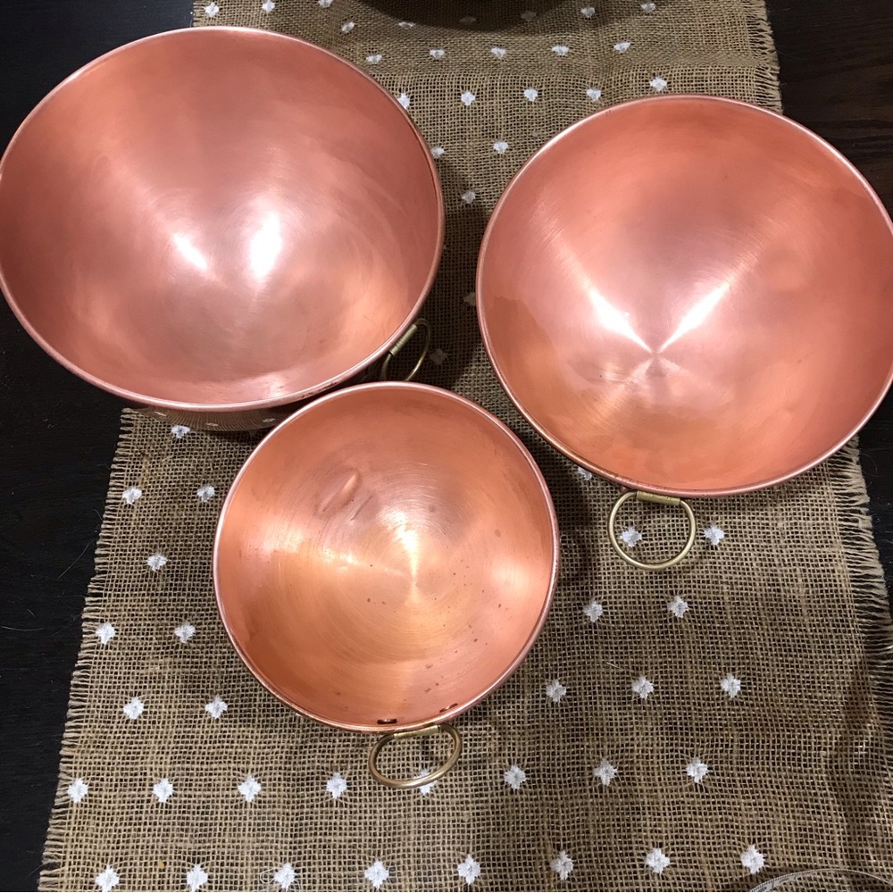 Copper bowls with brass hangers and solid copper hooks included.